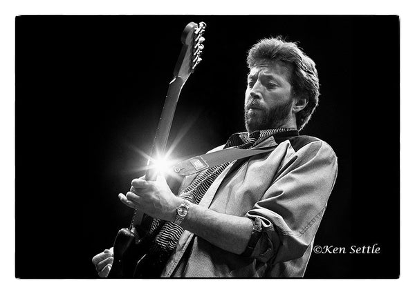 Eric Clapton performing at the Joe Louis Arena in Detroit, April 22nd 1987 original photography by Ken Settle is available at Rocker Tee Shirts